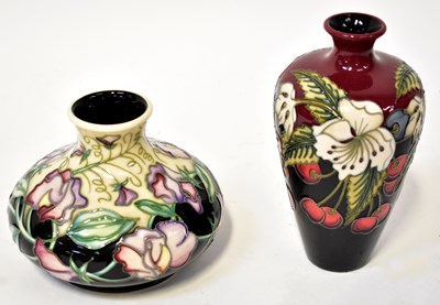 Lot 155 - MOORCROFT; a 'Sweet Pea' pattern squat...