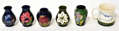 Lot 157 - MOORCROFT; six pieces of pottery comprising...