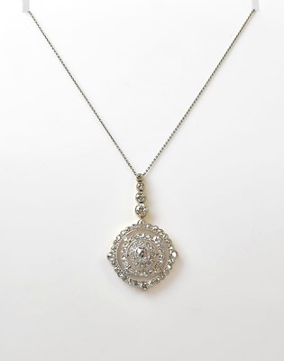 Lot An Edwardian yellow metal diamond pendant of...
