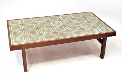 Lot 2 - A vintage tile top coffee table within a teak...