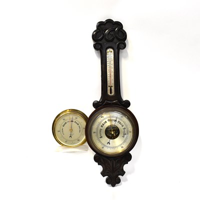 Lot 139 - A mid-20th century oak banjo barometer with...