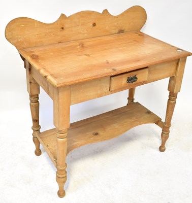 Lot 25 - An early 20th century pine wash stand, with...