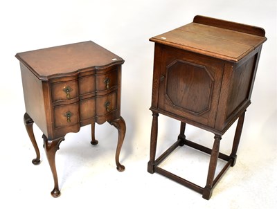 Lot 21 - A 1920s oak single-door pot cupboard, raised...