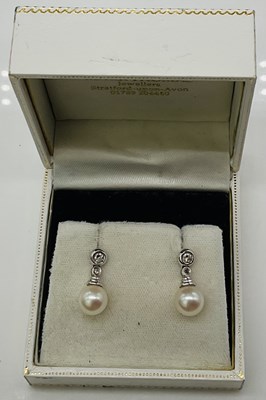 Lot 609 - A pair of 18ct white gold cultured pearl and...