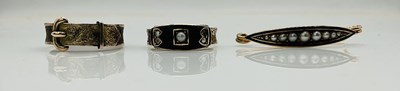 Lot 583 - A Victorian 9ct yellow gold black enamel hair...