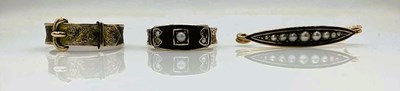 Lot 664 - A Victorian 9ct yellow gold black enamel hair...