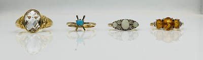 Lot 596 - Three 9ct yellow gold dress rings, the largest...