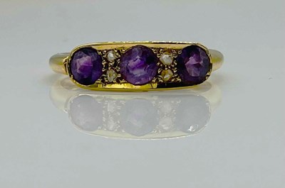 Lot 688 - An 18ct yellow gold amethyst and diamond chip...