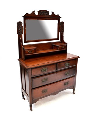 Lot 24 - An early 20th century walnut dressing chest...