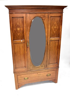 Lot 13 - An Edwardian inlaid mahogany wardrobe, the...