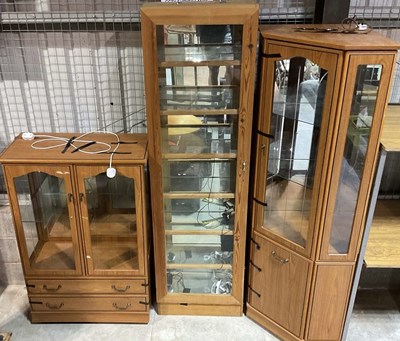 Lot 824 - Three glass display cabinets, all with...