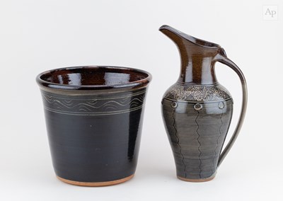 Lot 378 - JENNIE GILBERT; a tall stoneware Mishima jug,...
