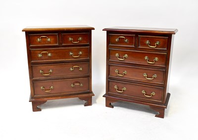 Lot 21 - A pair of small mahogany chests of drawers of...