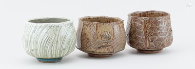 Lot 210 - BEN DODD; a trio of faceted stoneware chawan...