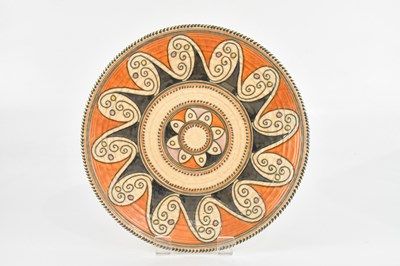 Lot 1928 - CROWN DUCAL; an orange ground wall charger,...