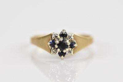 Lot 2586 - A 9ct yellow gold cluster ring, set with...