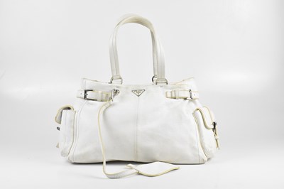 Lot 175 - PRADA; a white grained calfskin leather...