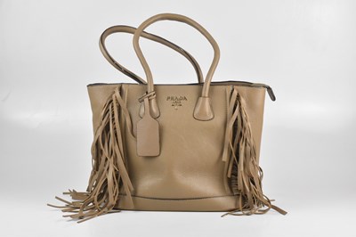 Lot 160 - PRADA; a tan deerskin pebbled leather Cervo...