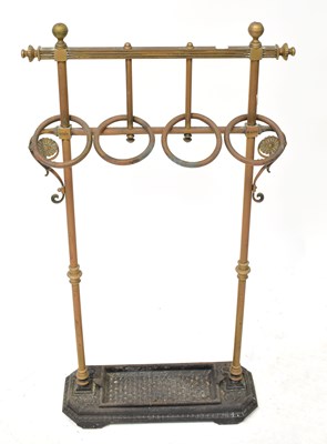 Lot 39 - A Victorian brass umbrella and stick stand,...