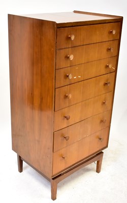 Lot 11 - A mid-20th century tall teak chest of seven...