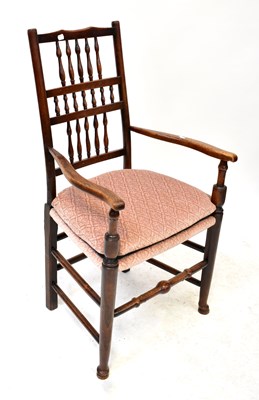 Lot 33 - A late 19th century open elbow chair with...