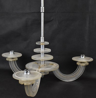 Lot 110 - An Art Deco clear plastic three-branch...