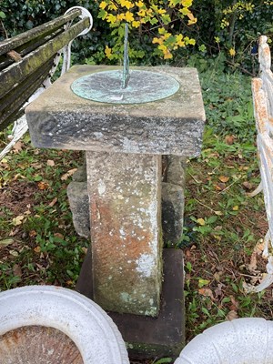 Lot 329 - A stone sundial, height 80cm.