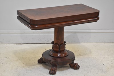 Lot 258 - A 19th century mahogany fold-over tea table,...