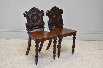 Lot 253 - A pair of Victorian carved mahogany hall...