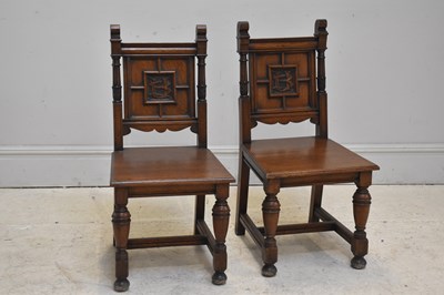 Lot 250 - A pair of Victorian oak hall chairs, with...