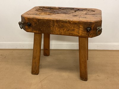 Lot 739 - A large wooden French butcher's block table,...