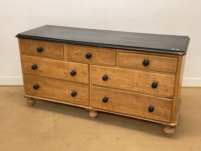 Lot 738 - A painted top pine dresser base with a row of...