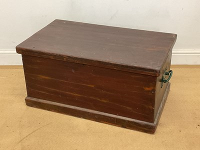 Lot 782 - A stained pine trunk with wrought iron handles,...