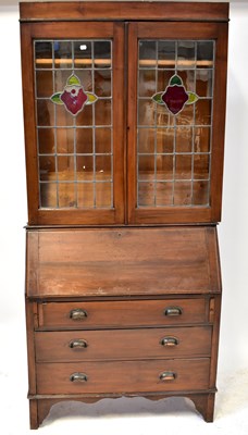 Lot 51 - A Georgian-style mahogany bureau bookcase with...
