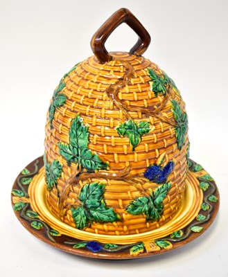 Lot 222 - A 20th century Majolica covered cheese dish in...