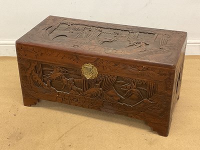 Lot 813 - A Chinese camphor carved wooden chest, height...