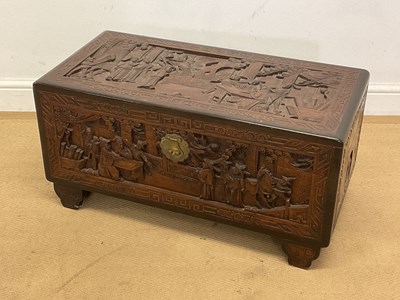 Lot 814 - A Chinese camphor carved wooden chest, height...