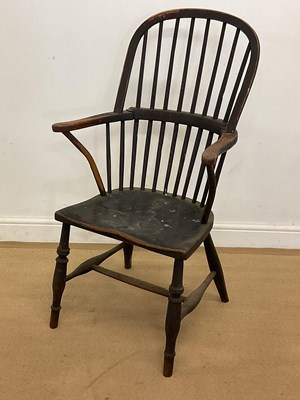 Lot 757 - A West Country hoop back elm and ash chair,...