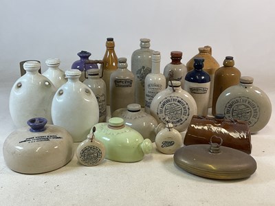 Lot 429 - A quantity of stoneware bottles, comprising...