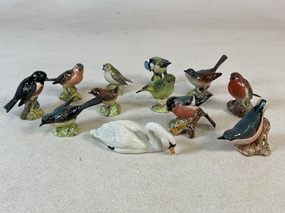 Lot 456 - BESWICK; twelve various birds, comprising...