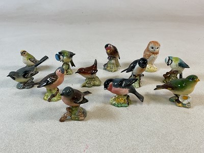 Lot 457 - BESWICK; twelve various birds, comprising...