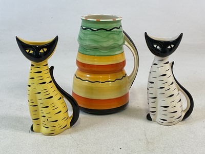 Lot 437 - ARTHUR WOOD; a pair of vases in the form of...