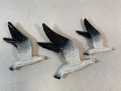 Lot 453 - BESWICK; a set of three wall hanging seagulls,...
