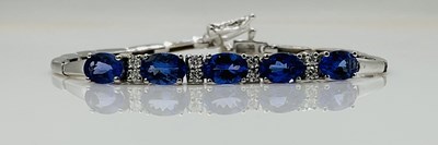 Lot 607 - A 14ct white gold tanzanite and diamond...