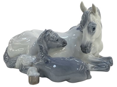 Lot 519 - ROYAL COPENHAGEN; a Danish porcelain figure of...