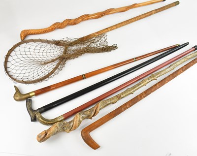 Lot 1094 - A collection of modern walking sticks,...