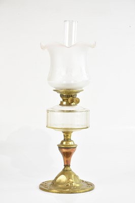 Lot 2036 - A brass Art Nouveau style oil lamp, with...