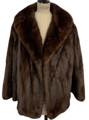 Lot 460 - An early 20th century dark mink fur coat, with...