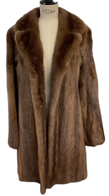 Lot 461 - An early 20th century mink fur coat, with...