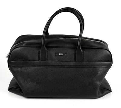 Lot 697 - HUGO BOSS; an unused black pebble leather...